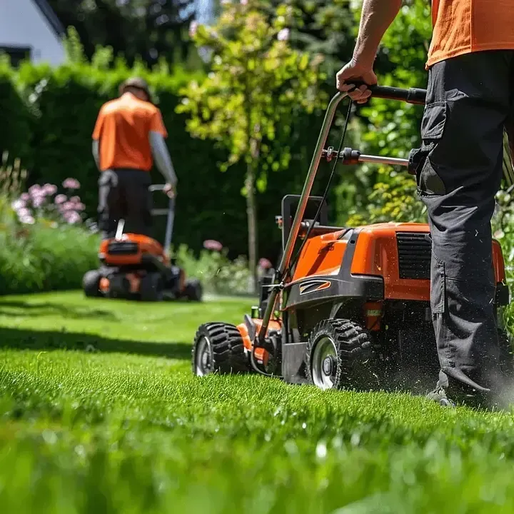 Castillo landscaping crew mowing a green lawn